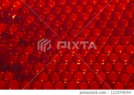 Red water gel balls. Polymer gel. Silica gel. Balls of hydrogel round shape. Crystal liquid ball with reflection. Water beads Red water gel balls. Polymer gel. Silica gel. Balls of hydrogel round shape. Crystal liquid ball with reflection. Water beads 121074034