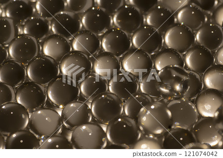White water gel balls. Polymer gel. Silica gel. Balls of hydrogel round shape. Crystal liquid ball with reflection. Water beads White water gel balls. Polymer gel. Silica gel. Balls of hydrogel round shape. Crystal liquid ball with reflection. Water beads 121074042