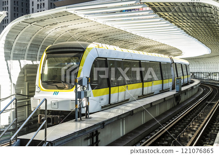 A train traveling on the Circular Line (Yellow Line) metro in New Taipei City, Taiwan, The metro with driverless technology. 121076865