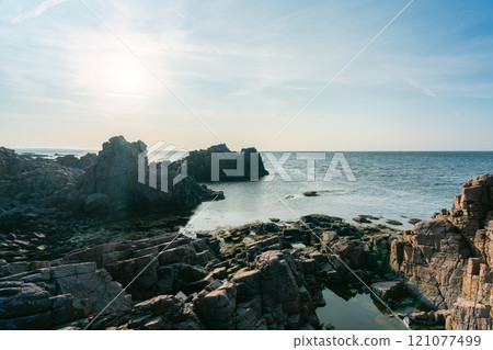 Coastal rocks and calm seascape 121077499