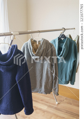 hang the hoodie on a hanger 121077765