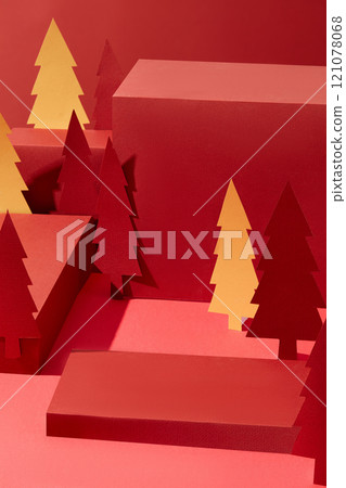 Four-cube podium with an empty space for displaying products, surrounded by some red and beige paper Noel trees. A Christmas picture with a top-down view in the crimson backdrop. Four-cube podium with an empty space for displaying products, surrounded by some red and beige paper Noel trees. A Christmas picture with a top-down view in the crimson backdrop. 121078068
