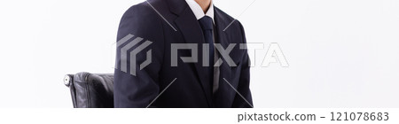 Image of a businessman listening to something (stock photo) Image of a businessman listening to something (stock photo) 121078683