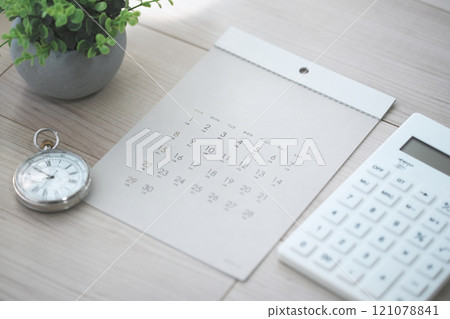 Calendar, pocket watch and calculator 121078841