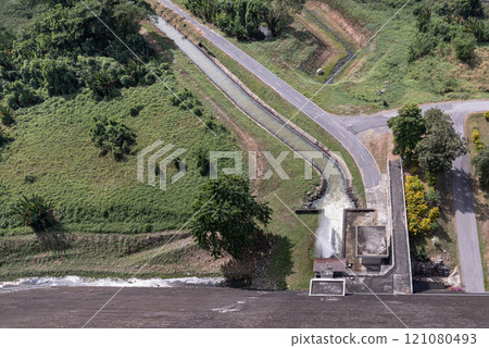 Drainage Khun Dan Prakan Chon Dam reservoir on hill with canal and drainage system water flow to river nature. 121080493