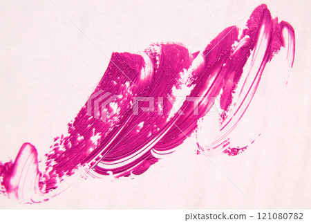A smear of lipstick in bright pink on a white background 121080782