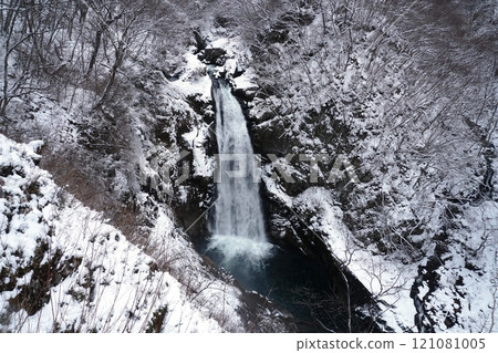 Winter scenery of Akiu Otaki waterfall flowing down a snow-covered valley in the harsh winter Ver1 Winter scenery of Akiu Otaki waterfall flowing down a snow-covered valley in the harsh winter Ver1 121081005