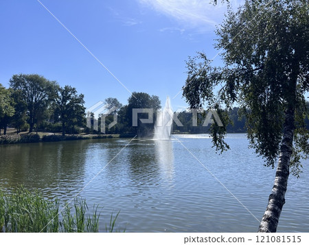 A water fountain in a pond A water fountain in a pond 121081515