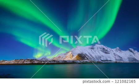 Aurora Borealis in Scandinavia. Norway, Lofoten islands. Northern lights over the mountains. Aurora Borealis in Scandinavia. Norway, Lofoten islands. Northern lights over the mountains. 121082165