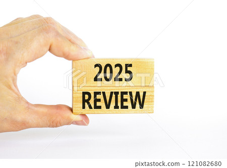 Planning 2025 review new year symbol. Concept words 2025 Review on beautiful wooden blocks. Beautiful white background. Businessman hand. Business 2025 review new year concept. Copy space. Planning 2025 review new year symbol. Concept words 2025 Review on beautiful wooden blocks. Beautiful white background. Businessman hand. Business 2025 review new year concept. Copy space. 121082680
