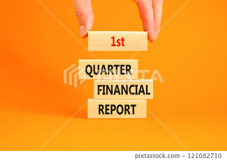 1st quarter financial report symbol. Concept words 1st quarter financial report on beautiful wooden blocks. Beautiful orange background. Business 1st quarter financial report concept. Copy space. 1st quarter financial report symbol. Concept words 1st quarter financial report on beautiful wooden blocks. Beautiful orange background. Business 1st quarter financial report concept. Copy space. 121082710
