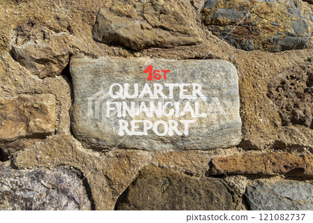 1st quarter financial report symbol. Concept words 1st quarter financial report on beautiful grey stone. Beautiful stone wall background. Business 1st quarter financial report concept. Copy space. 121082737