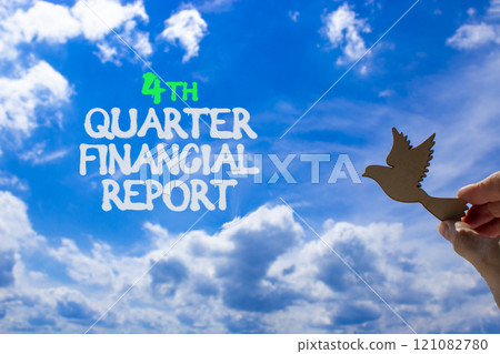 4th quarter financial report symbol. Concept words 4th quarter financial report. Beautiful blue sky and clouds background. Businessman hand. Business 4th quarter financial report concept. Copy space. 4th quarter financial report symbol. Concept words 4th quarter financial report. Beautiful blue sky and clouds background. Businessman hand. Business 4th quarter financial report concept. Copy space. 121082780