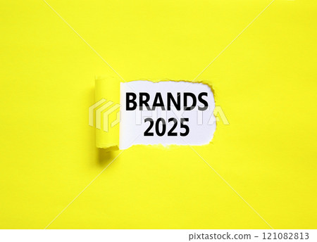 Planning brands 2025 new year symbol. Concept words Brands 2025 on beautiful white paper. Beautiful yellow paper background. Business brands 2025 new year concept. Copy space. 121082813