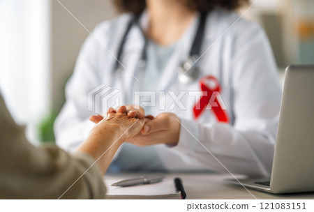 patient and a doctor in medical office 121083151