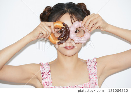 Casual girly portrait of a young woman Casual girly portrait of a young woman 121084210