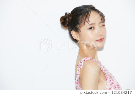 Casual girly portrait of a young woman 121084217