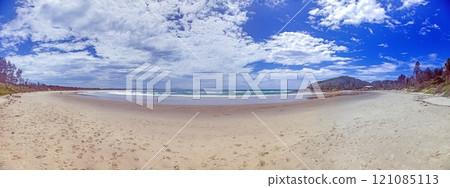 Golden Coast beach panorama with expansive sandy shore and ocean waves 121085113