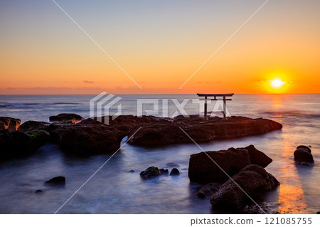 Autumnal torii gates and sunrise at Kamiiso, low tide, Oarai Town, Ibaraki Prefecture 121085755