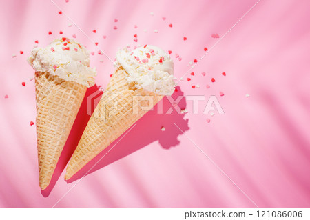 A charming ice cream cones treat adorned with heart-shaped decor A charming ice cream cones treat adorned with heart-shaped decor 121086006
