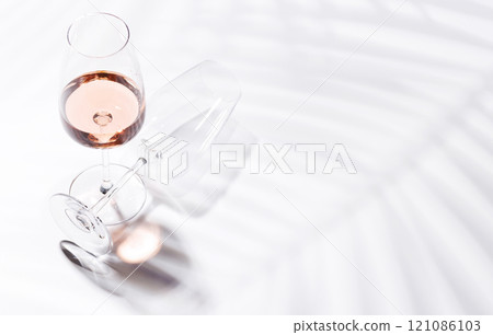 A glass of rose wine 121086103