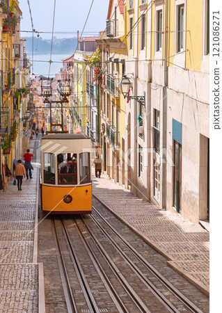 Lisbon Tram on Rua da Bica de Duarte Belo, Lisbon, Portugal Lisbon Tram on Rua da Bica de Duarte Belo, Lisbon, Portugal 121086271