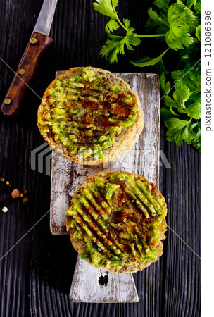 Fresh sandwich with avocado and herbs and seeds Fresh sandwich with avocado and herbs and seeds 121086396