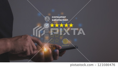 Consumer Satisfaction, Young Man hand holding Smart Phone with five star to review and give 5 stars  Consumer Satisfaction, Young Man hand holding Smart Phone with five star to review and give 5 stars  121086476