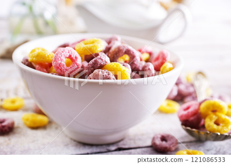 Concept of breakfast food, colorful corn flakes 121086533