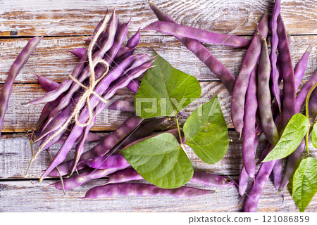 raw bean on light wooden table raw bean on light wooden table 121086859