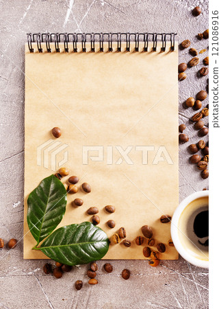 black coffee in coffee cup with coffee bean and on stone table 121086916