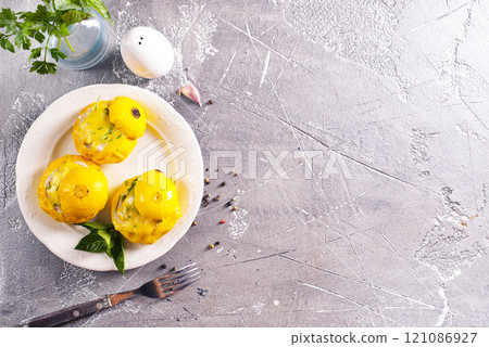 Stuffed pattypan squash on plate, vegetarian food Stuffed pattypan squash on plate, vegetarian food 121086927