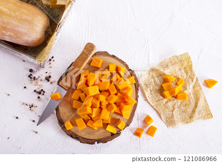 raw pumpkin cubes on board raw pumpkin cubes on board 121086966
