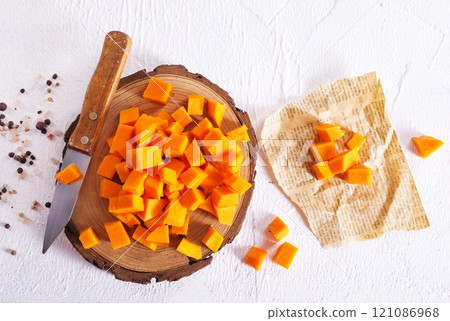 raw pumpkin cubes on board raw pumpkin cubes on board 121086968