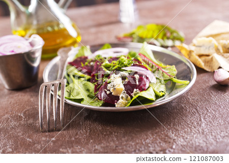 Tasty salad of beetroot, cheese and nuts. Copy space. 121087003