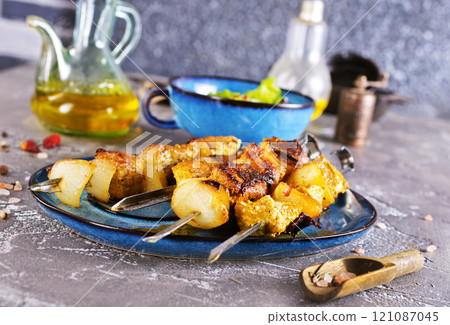Chicken skewers with spice and salt Chicken skewers with spice and salt 121087045