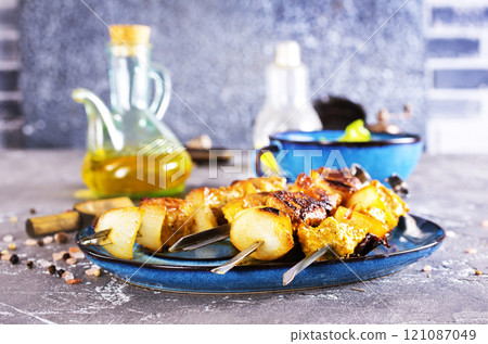 Chicken skewers with spice and salt Chicken skewers with spice and salt 121087049