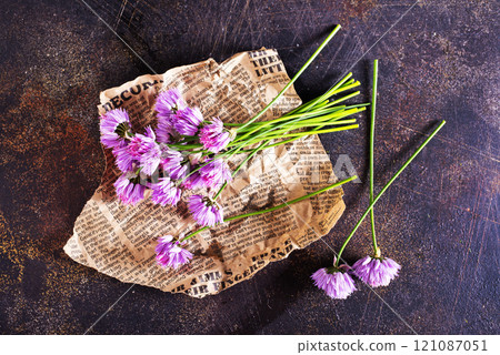 fresh allium flowers on a table 121087051