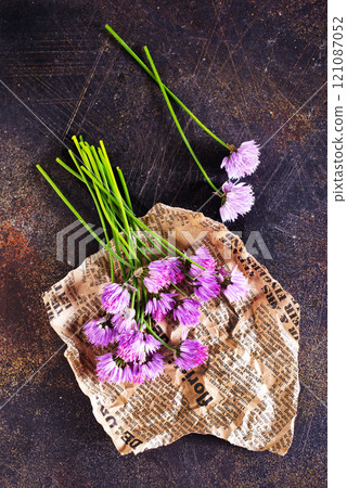 fresh allium flowers on a table 121087052