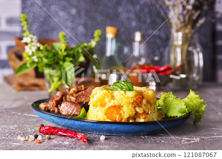 boiled rice with fried meat on plate boiled rice with fried meat on plate 121087067