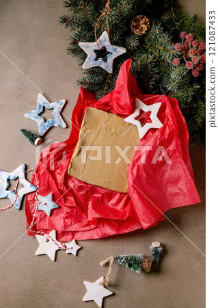 Piece of raw clay as a gift 121087433