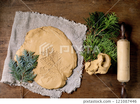 Decorating of raw clay ceramics Decorating of raw clay ceramics 121087446
