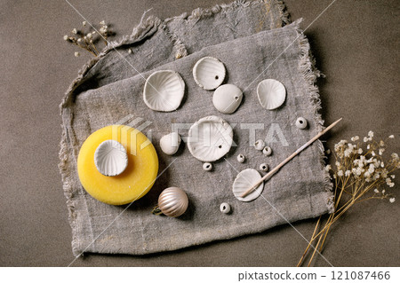 handcrafted beads from raw porcelain handcrafted beads from raw porcelain 121087466