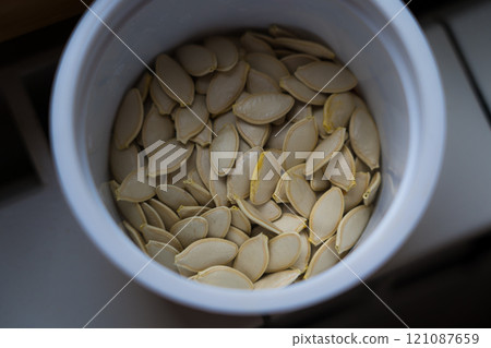 Pumpkin seeds in a jar. Dried Pumpkin Seeds Pumpkin seeds in a jar. Dried Pumpkin Seeds 121087659
