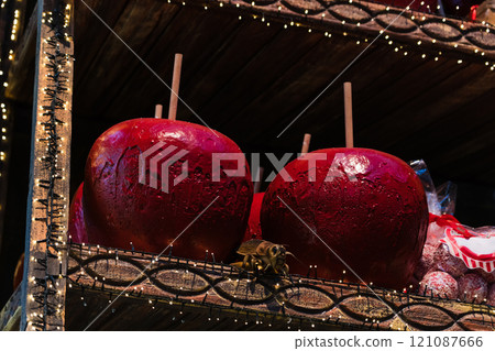 Huge Christmas apples in caramel. New Year decorations Huge Christmas apples in caramel. New Year decorations 121087666