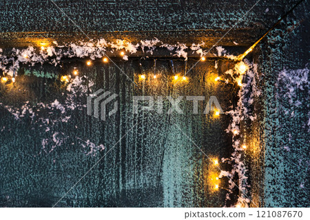 The corner of the door is decorated with a garland. Christmas background The corner of the door is decorated with a garland. Christmas background 121087670