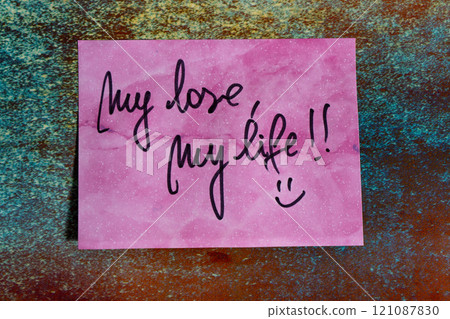Love note on a post-it or self-adhesive paper. Love note on a post-it or self-adhesive paper. 121087830