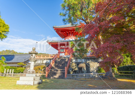 Autumn in Kyoto: Daikakuji Temple - Heart Sutra Pagoda surrounded by autumn leaves 121088366
