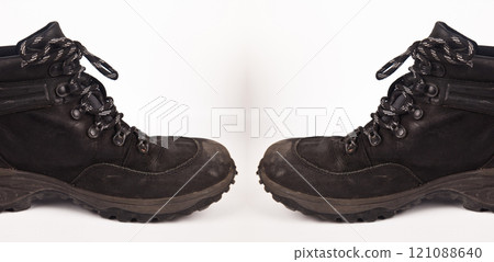 Hiking shoes and a white background, Sturdy hiking boots Hiking shoes and a white background, Sturdy hiking boots 121088640