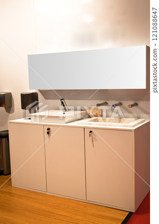 Modern luxury bathroom sink and brown cabinet design 121088647